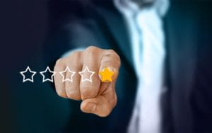 Person pointing at one star rating